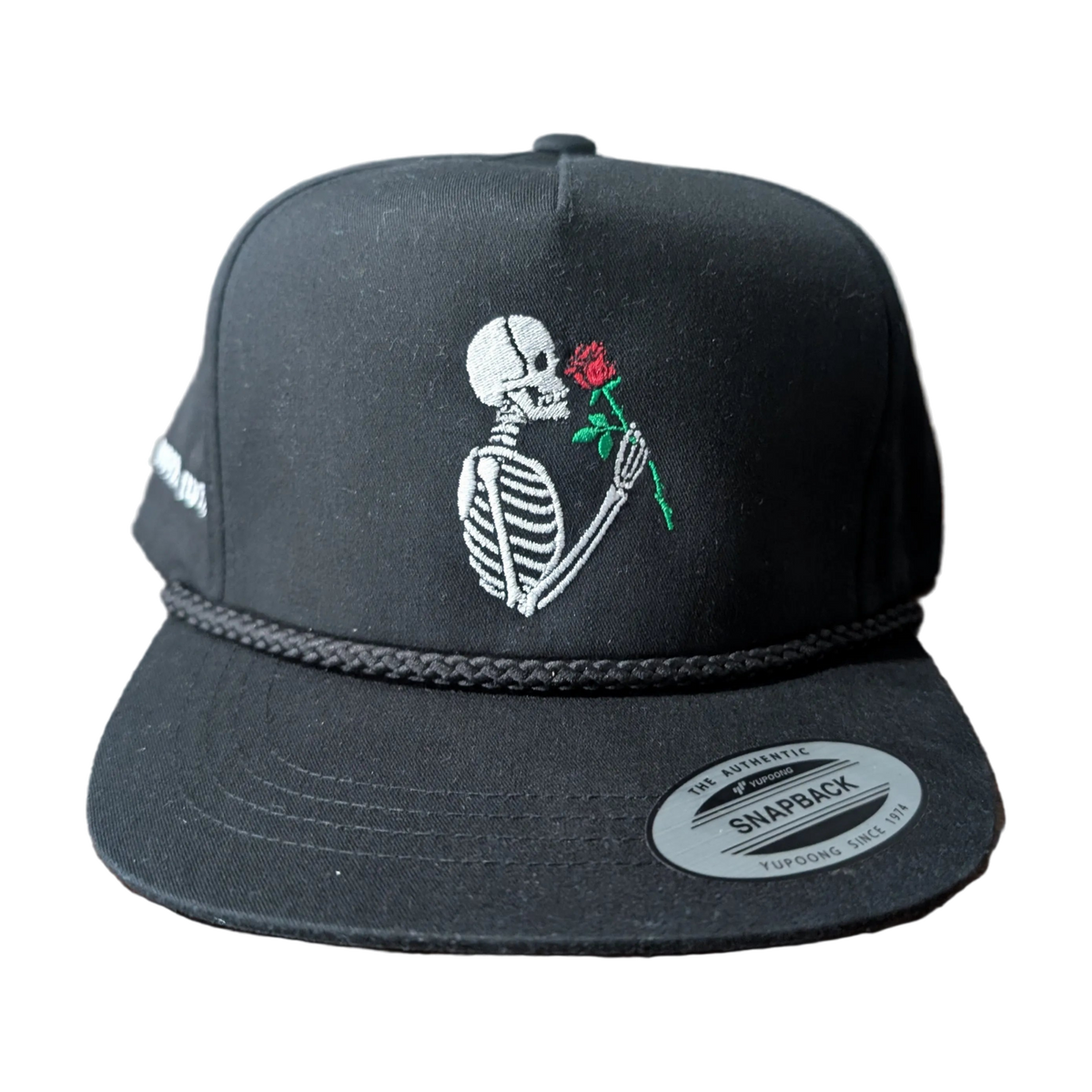 Front view of black cotton-poly Dead Men Don't Smell Roses snapback hat